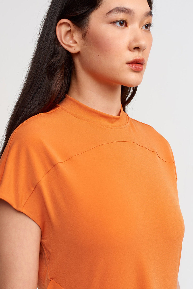 NU Solid Asymmetrical Blouse Amber